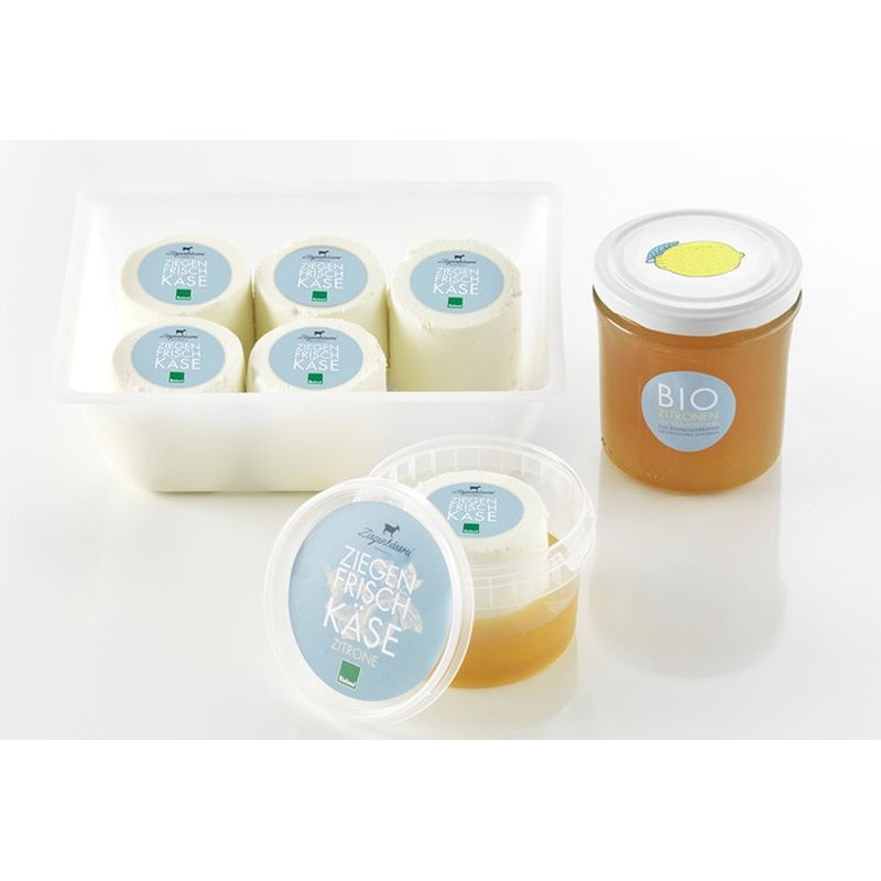 Ziegenkäserei Würnsreuth 6 Bio-Ziegenfrischkäsezylinder auf Bio-Zitronenfruchtzubereitung zur Zusammenstellung an der Theke - Produktbild