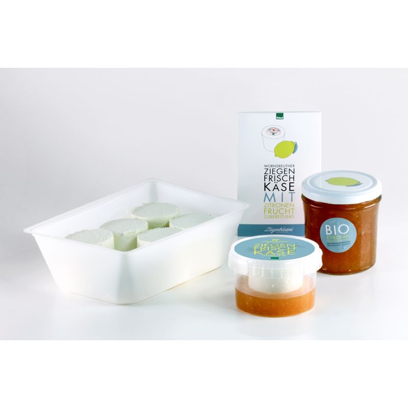 Ziegenkäserei Würnsreuth 6 Bio-Ziegenfrischkäsezylinder auf Bio-Zitronenfruchtzubereitung zur Zusammenstellung an der Theke - Produktbild