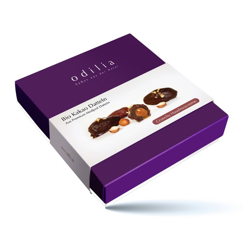 odilia Bio Dattel Haselnusscreme von odilia vereint fein geröstete Haselnüsse, umhüllt von zarter Schokolade aus Kakaomasse, Kakaobutter und natürlicher Dattelsüße. Vegan, glutenfrei, laktosefrei und ohne Zuckerzusatz – ein cremig knuspriger Genuss. - Produktbild