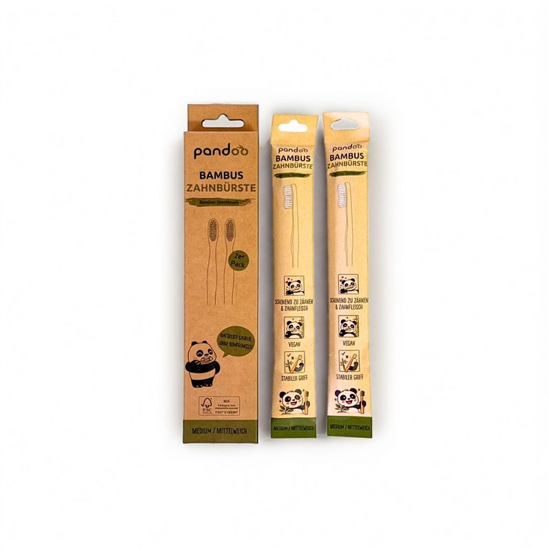 pandoo pandoo Zahnbürsten mit ergonomischem Bambusgriff und mittelweichen Borsten – im 2er-Pack mit Gravuren zur Unterscheidung. - Produktbild